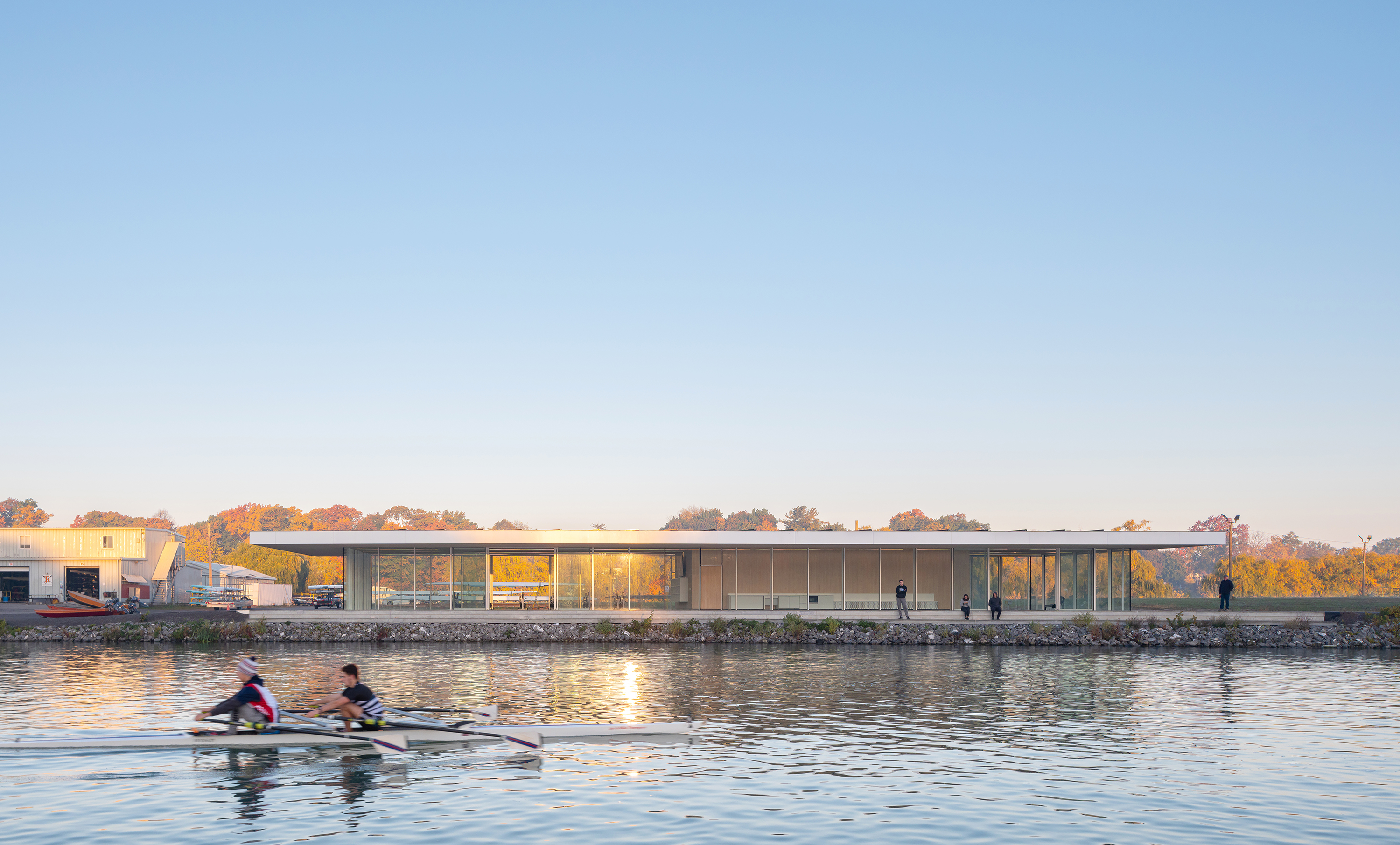 East elevation of the NCRC from the Martindale Pond with rowers on Henley Rowing Course.